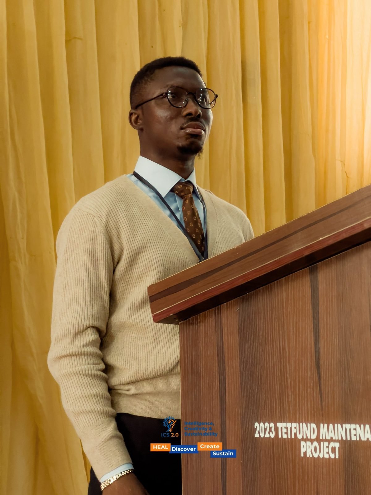 Samuel Adegboyega at the podium, ICS 2.0